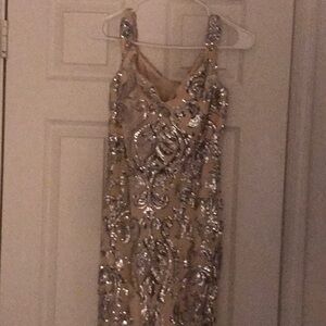 Very elegant design with accents very long formal dress.size large